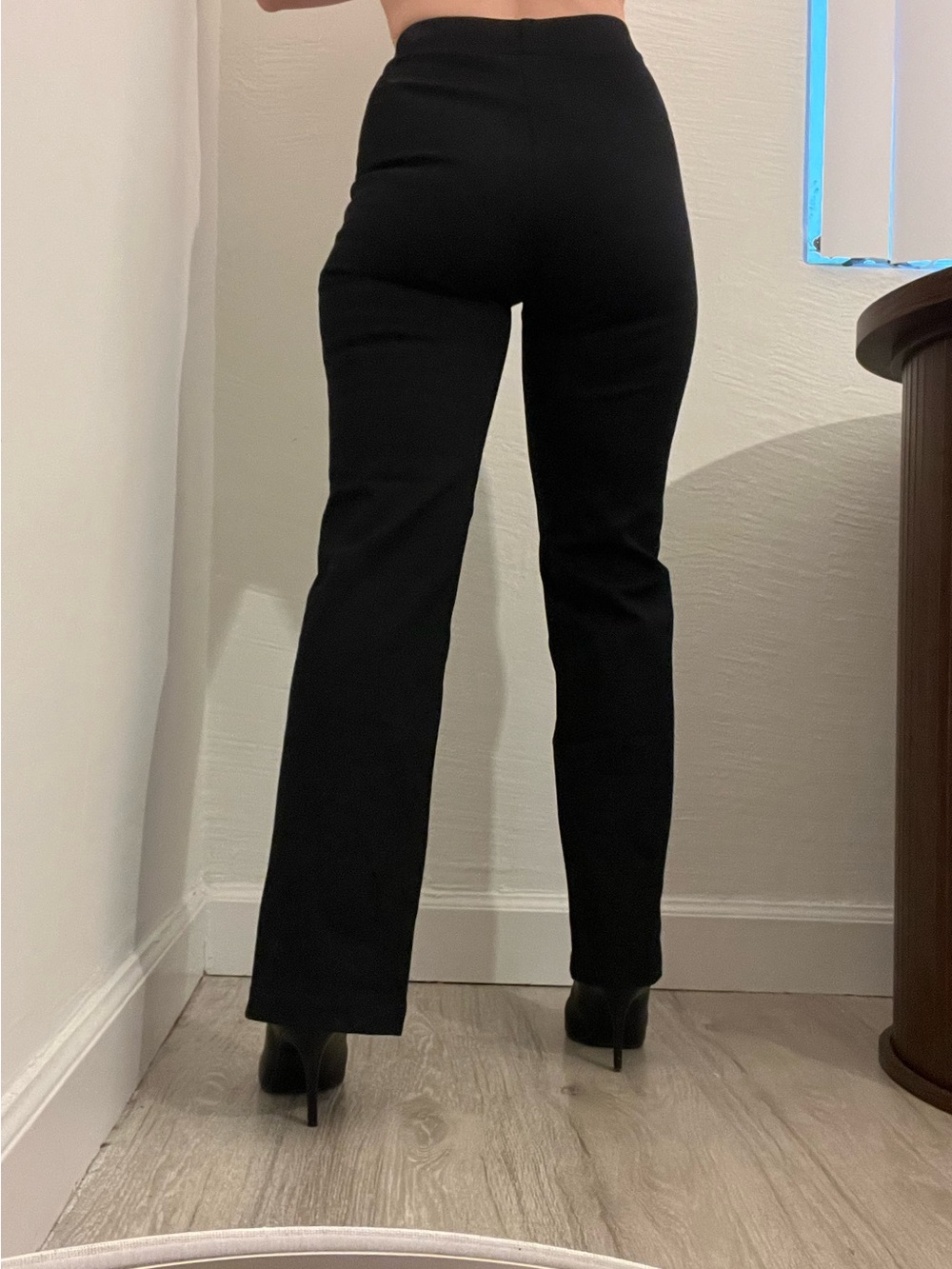 Black stretch flair pants with front slit